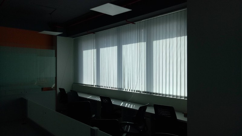 White vertical blinds in an office