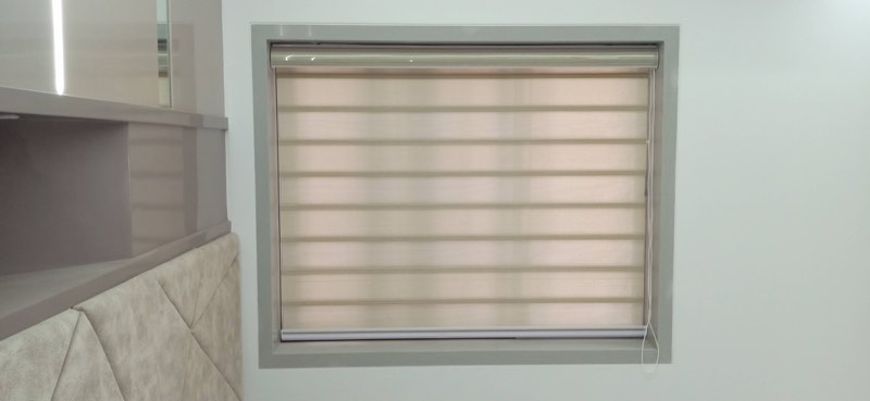 White zebra blind in a recessed window